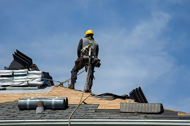 Professional Roof Replacement technician working in Marion, ND